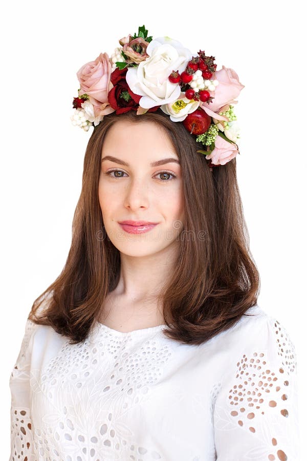 Portrait of beautiful girl with flower wreath