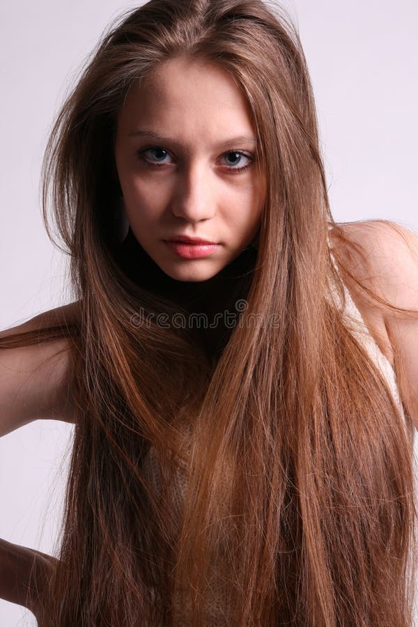 Portrait of beautiful girl with flowing hair.