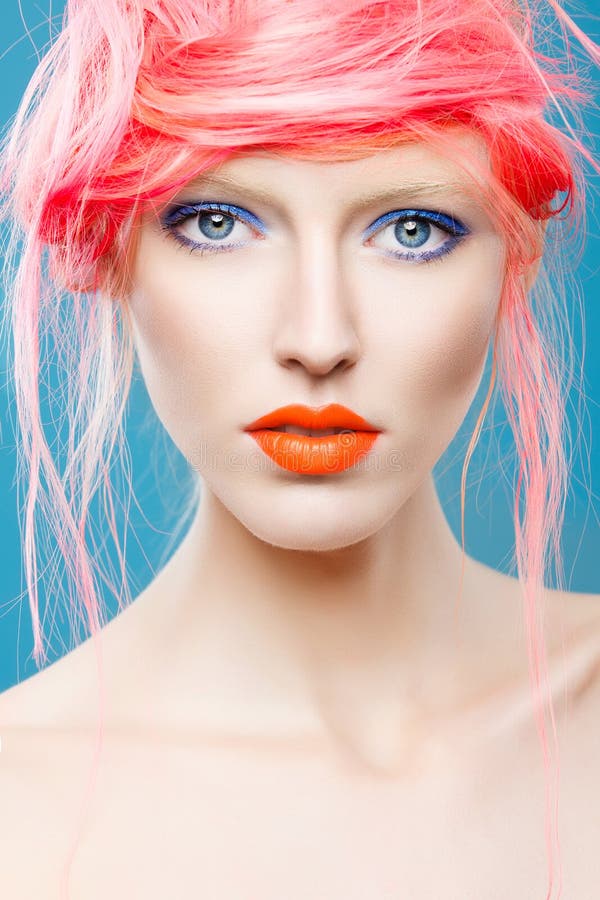 Portrait of beautiful girl with pink hair