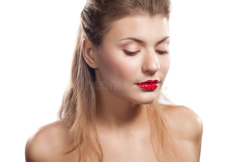 Portrait of a beautiful girl with red lips