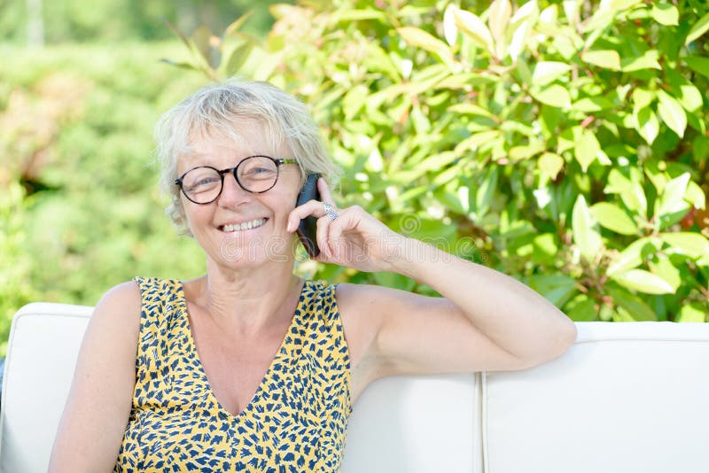 Portrait of a beautiful middle-aged woman stock photography.