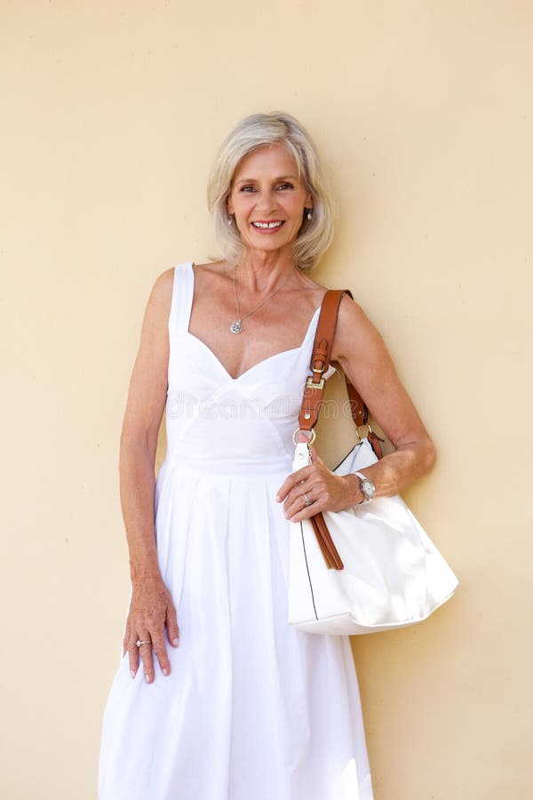 Beautiful Older Woman with Summer Dress and Purse Stock Image - Image ...