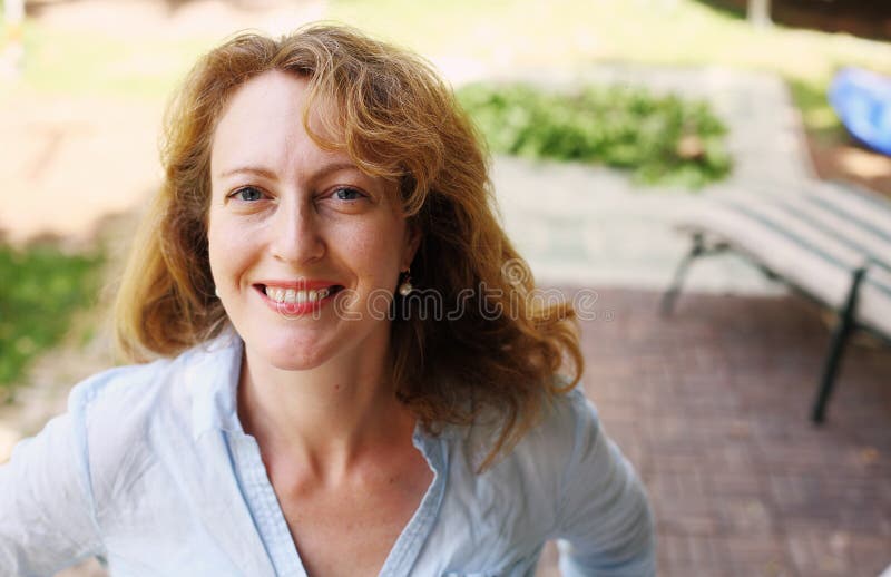 Portrait of beautiful real 40 years old woman