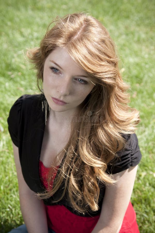 Redhead Girl With Green Eyes