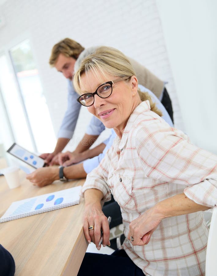 Portrait of Beautiful Senior Woman Attending Class Stock Image - Image