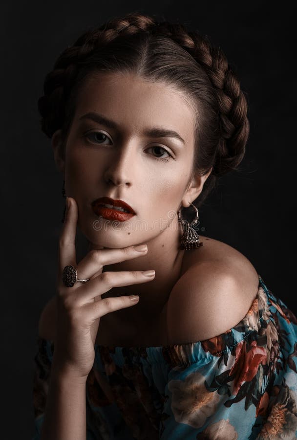 Portrait of beautiful sensual woman with elegant hairstyle