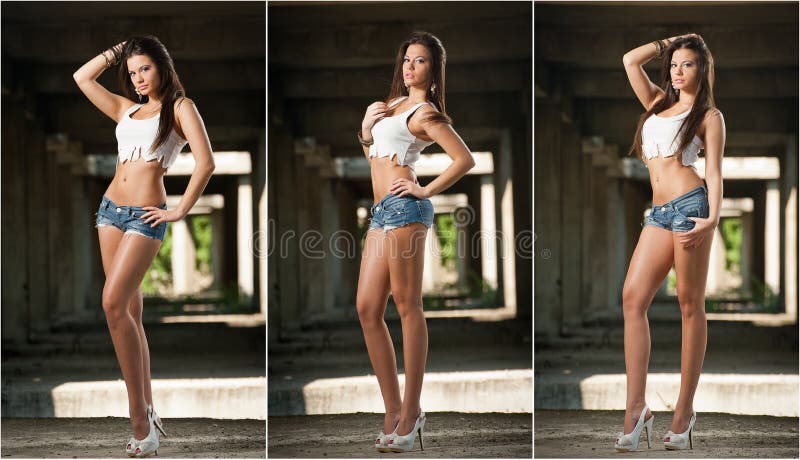 Portrait of a beautiful woman with denim shorts and white cropped t-shirt in urban background. Attractive brunette posing