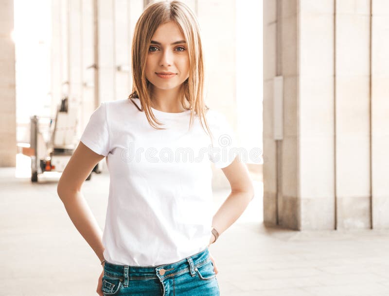 Beautiful smiling blond model dressed in summer hipster clothes