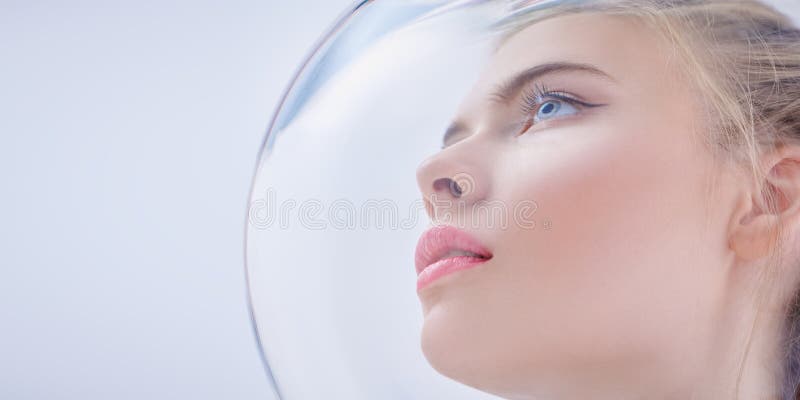 Girl in a glass spacesuit