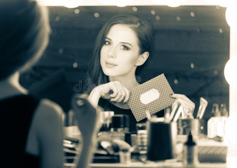 Portrait of a beautiful woman with certificate.