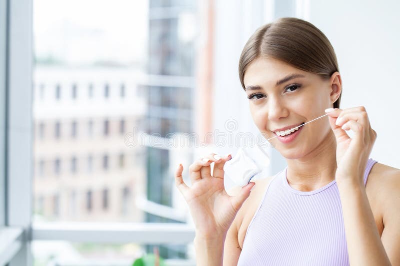 Portrait Of Beautiful Woman Cleaning Teeth With Dental Floss Stock Image Image Of Doctor