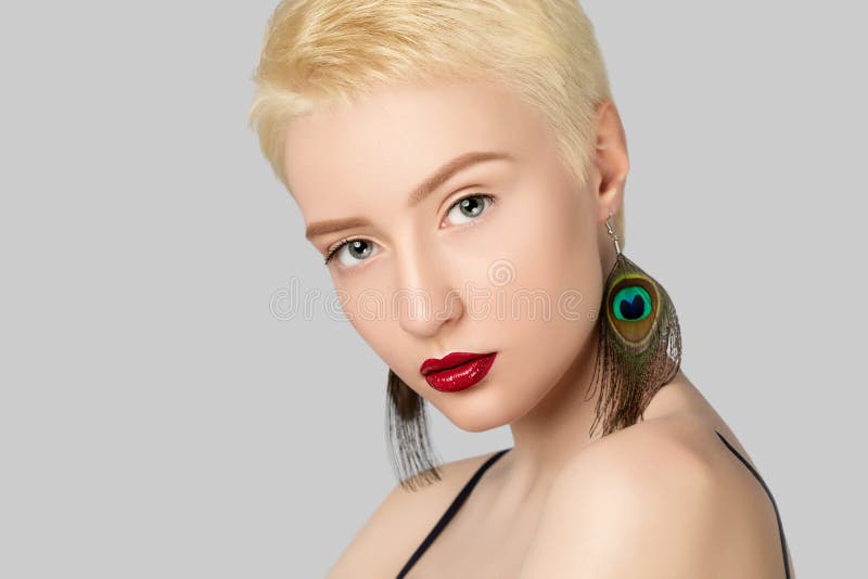 Portrait Of A Beautiful Woman With Short Blonde Hair Beautiful Fresh Make Up And With Feather Earrings Makeup And Cosmetology Stock Image Image Of Botox Care 186959969