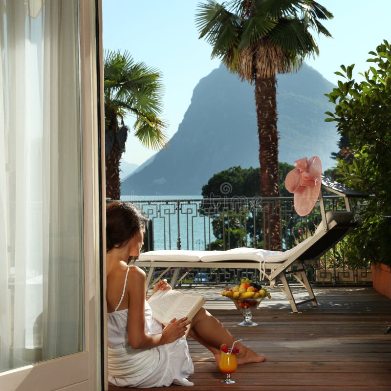 Portrait of beautiful woman on the terrace