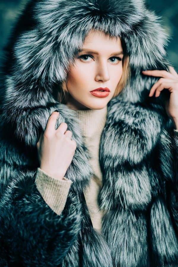 Warm fluffy fur coat stock image. Image of beautiful - 164886773