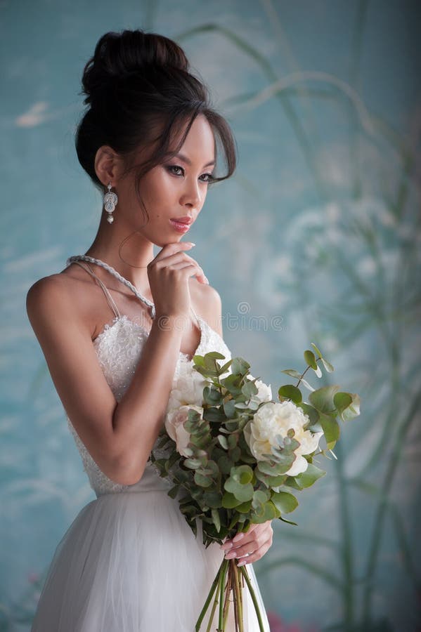 Portrait of beautiful young asian bride woman