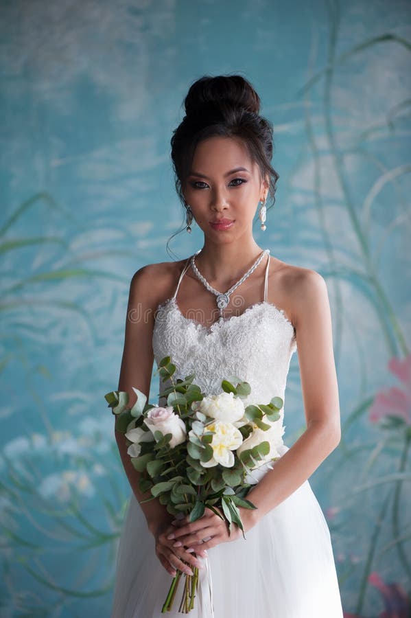 Portrait of beautiful young asian bride woman