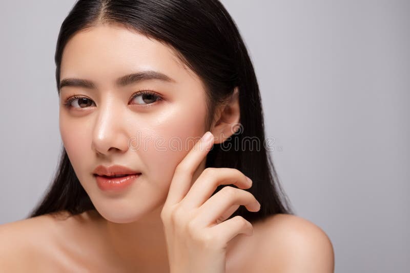 Portrait of beautiful young asian woman clean fresh bare skin concept. Asian girl beauty face skincare and health wellness, stock images Portrait of beautiful young asian woman clean fresh bare skin concept. Asian girl beauty face skincare and health wellness, stock images