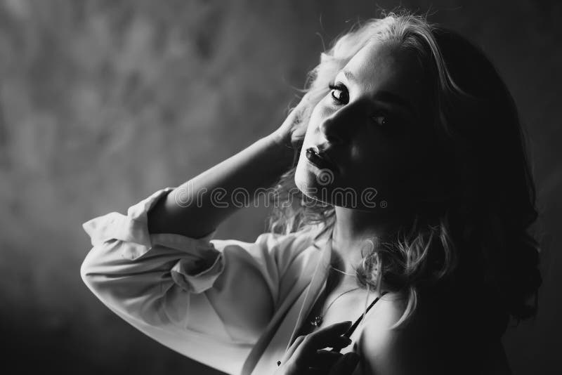 Portrait of a Beautiful Young Blonde Girl in Low Key. Black and White Art  Photo. Soft Selective Focus Stock Photo - Image of black, hairstyle:  181812244