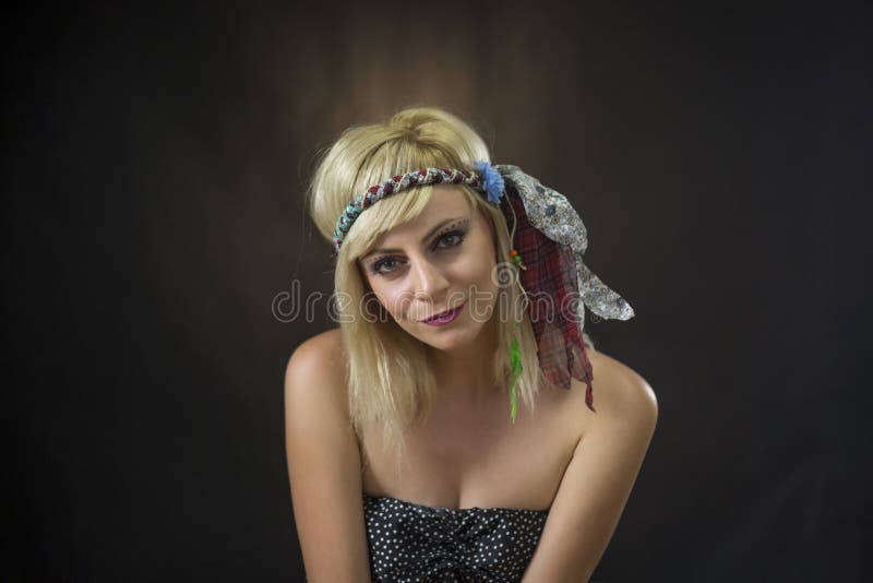 Portrait Of Beautiful Young Woman Wearing Hippie Headband