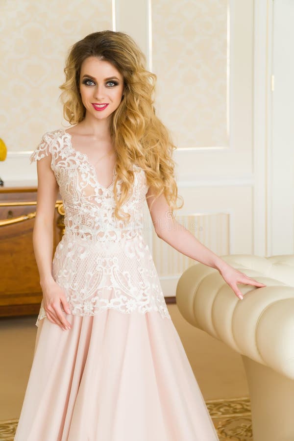 Portrait of Beautiful Young Bride. a Girl is Posing in a Hotel Room ...