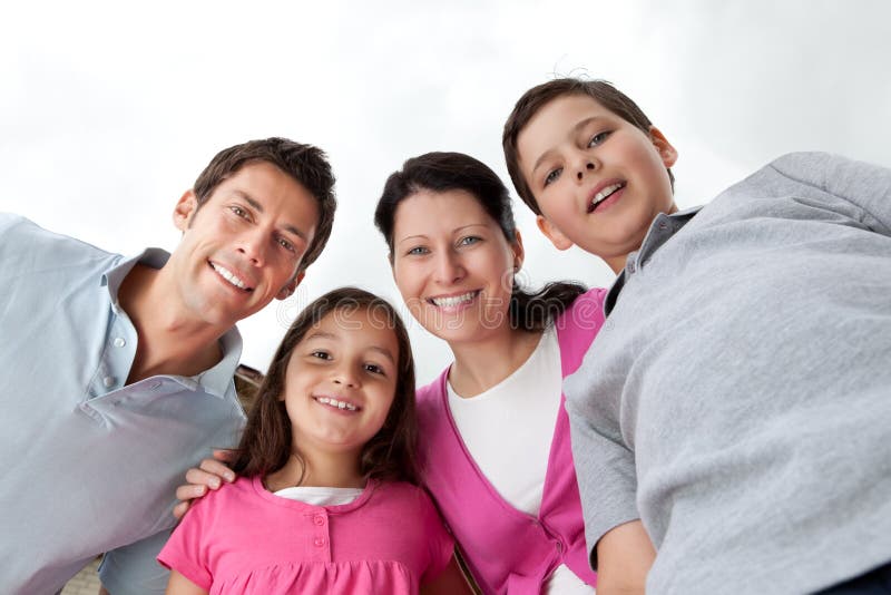 Portrait of beautiful young family together stock images