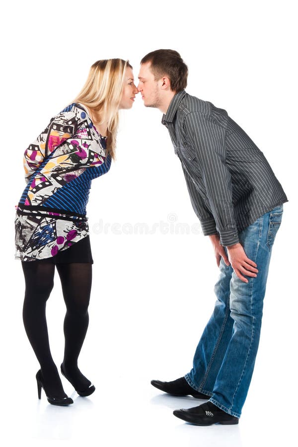 Portrait of a beautiful young happy couple kissing