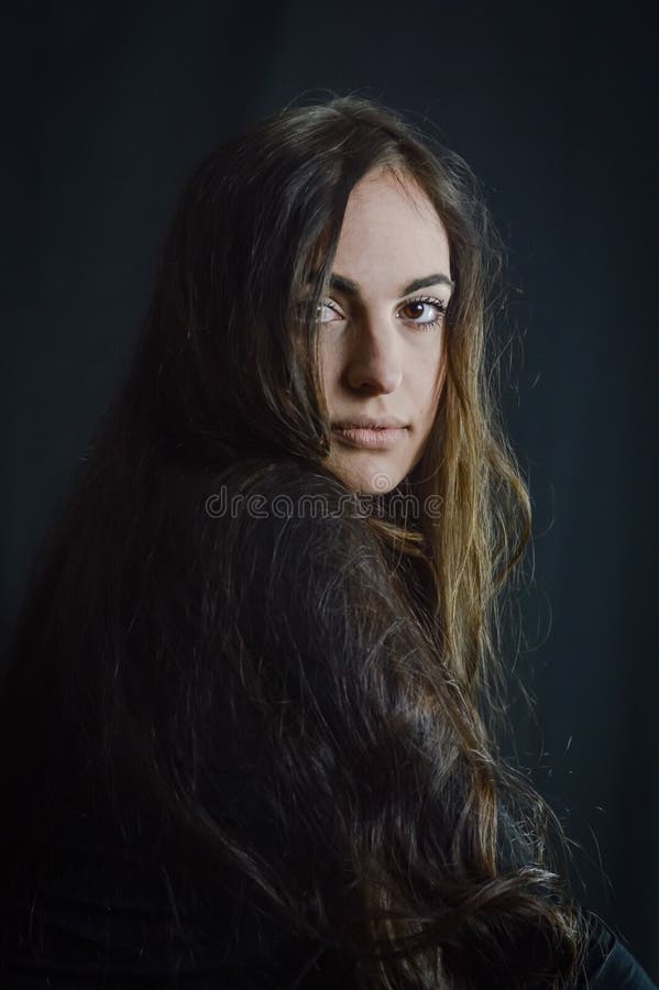 Portrait of a Beautiful Young Italian Woman with Very Long Hair with a ...