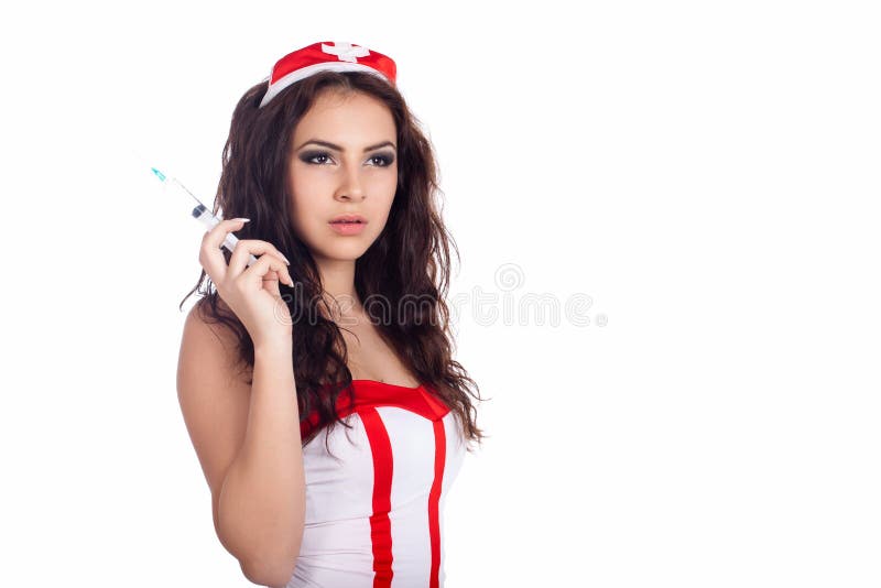 Portrait of a beautiful young nurse with syringe