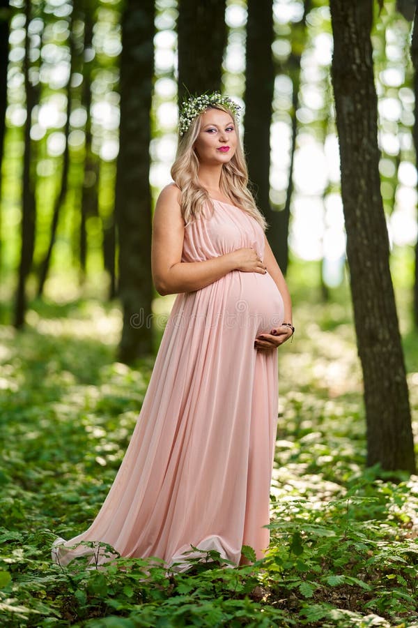 Young Pregnant Woman Outdoor Stock Image - Image of green, beautiful ...