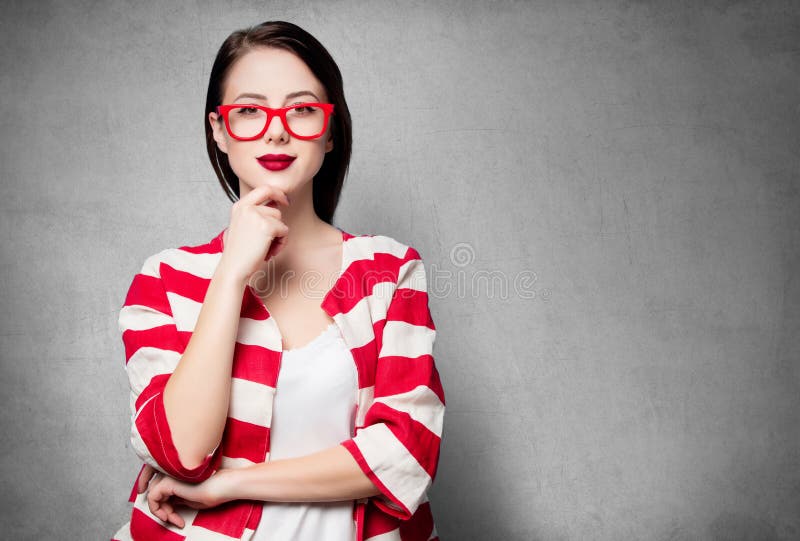 Portrait of the beautiful young smiling woman on