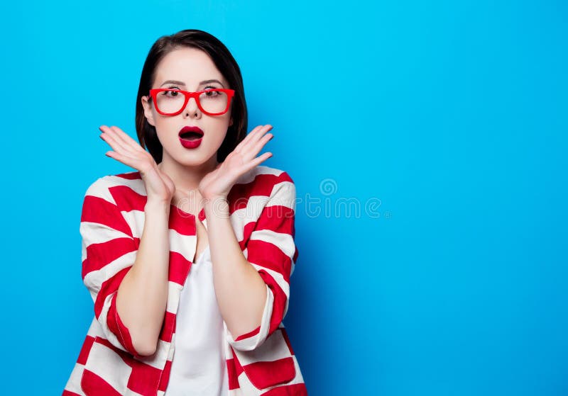 Portrait of the beautiful young surprised woman