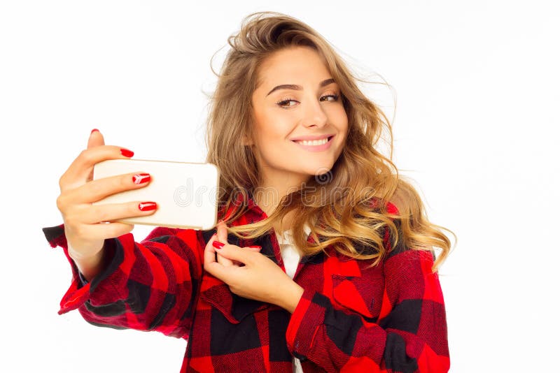 Portrait Of A Beautiful Young Woman Making Selfie On Smart Phone Stock