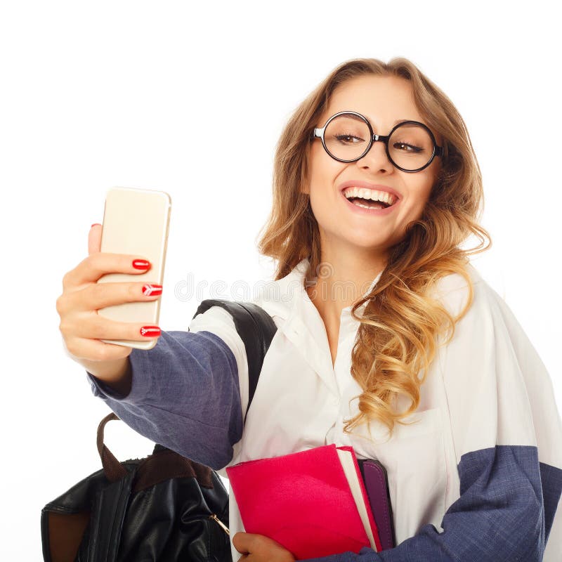 Portrait Of A Beautiful Young Woman Making Selfie On Smart Phone Stock