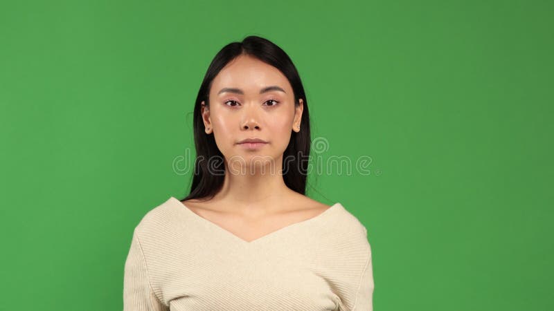 Portrait of beautiful young woman with serious look. Female model of Caucasian, Caucasian Asian mixed race. stock images Portrait of beautiful young woman with serious look. Female model of Caucasian, Caucasian Asian mixed race. stock images