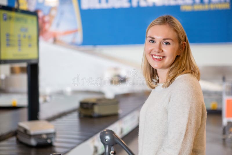 Beautiful Young Woman Smiling At Airport stock images Beautiful Young Woman Smiling At Airport stock images