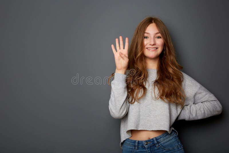 Portrait of a beautiful young woman, teenager counts funny