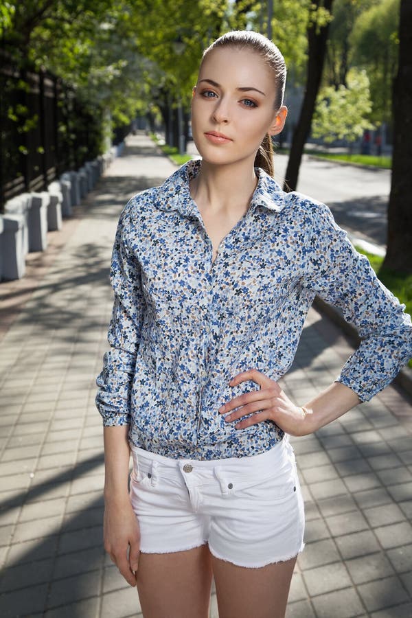 Beautiful Girl Walking Down the Street Stock Photo - Image of looking
