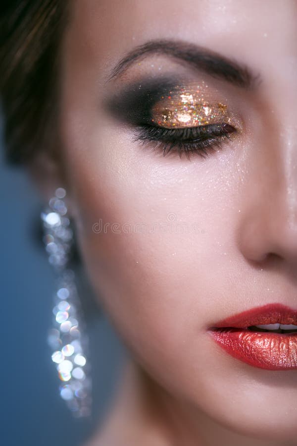 Portrait of beauty young woman with shine makeup