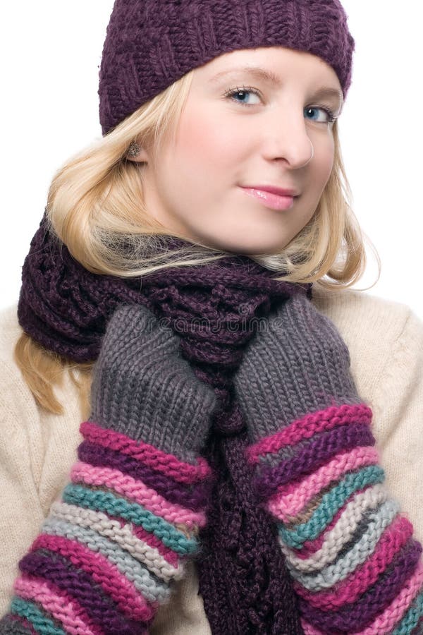 Portrait of a beauty young woman in a warm hat and royalty free stock photo