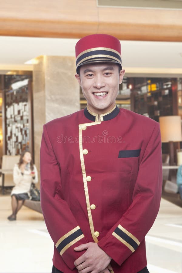 Portrait of Bellhop, Greeting, Studio Shot Stock Photo Image of adult