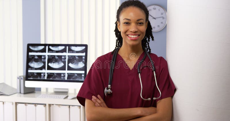 Portrait of black woman medical doctor in hospital
