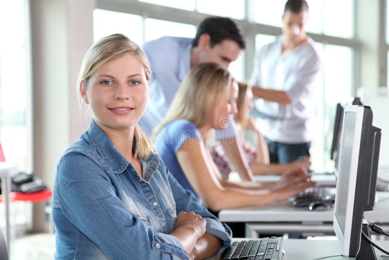 Portrait of blond woman in business training