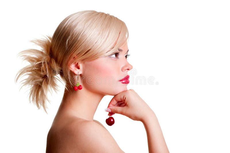 Portrait of blonde with red cherry