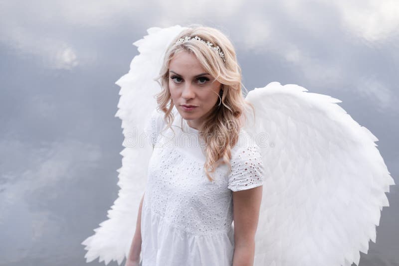 Portrait of Blonde Woman in White Dress and White Angels Wings. Good ...