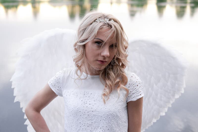 Portrait of Blonde Woman in White Dress and White Angels Wings. Good ...
