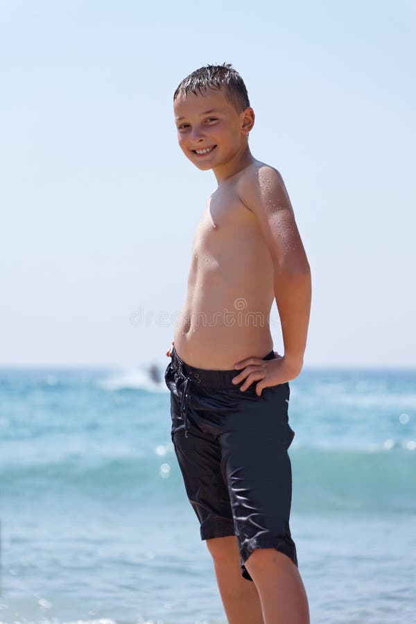 Portrait of a boy by the sea during