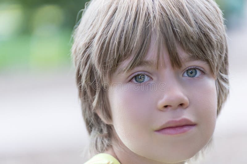 Portrait of a Boy with a Striking Blue Eyes Stock Image Image of