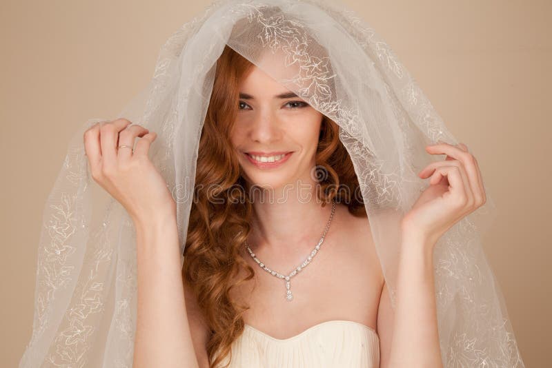 Portrait of bride with curly hairstyle and beautiful makeup stock photography Portrait of bride with curly hairstyle and beautiful makeup stock photography