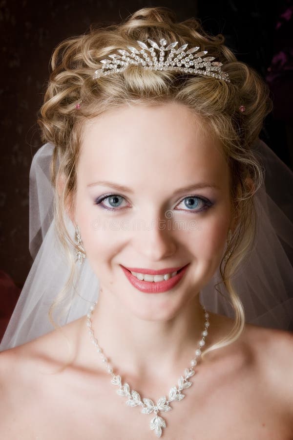 Portrait of the bride on a dark background