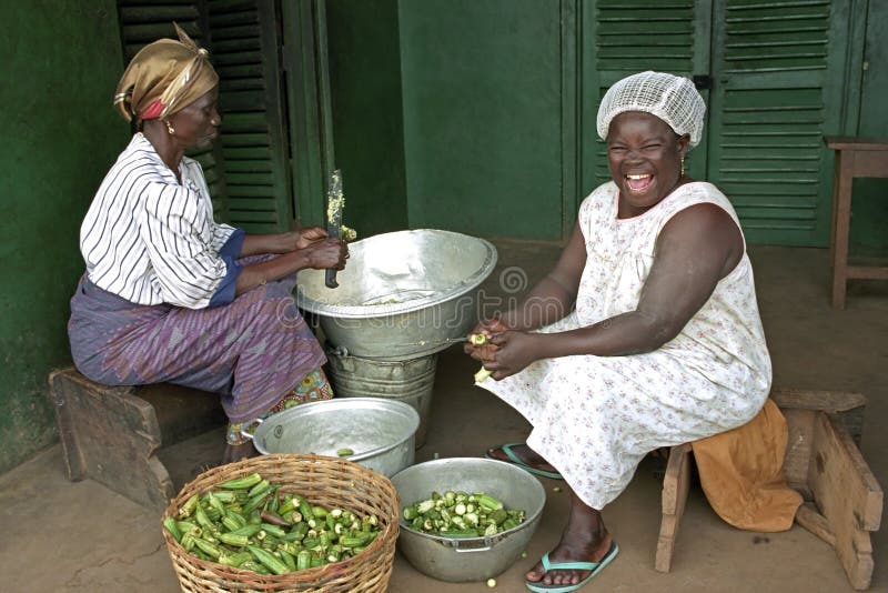 Portrait of burst of laughter Ghanaian cook stock photos Portrait of burst of laughter Ghanaian cook stock photos